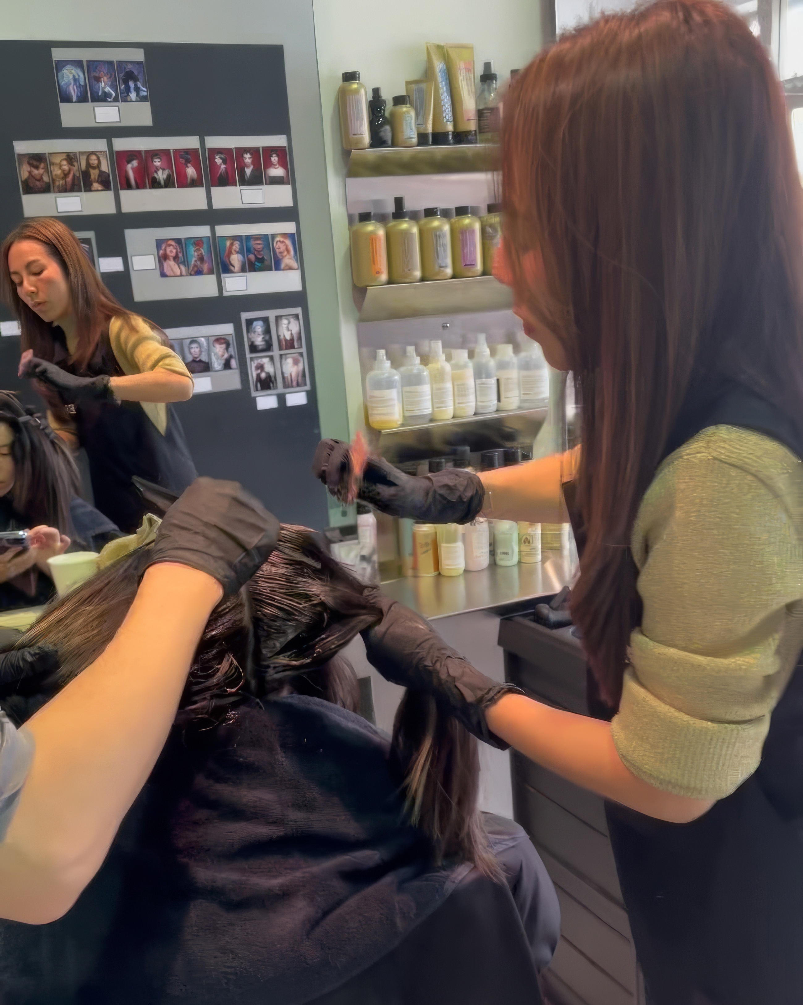 Amika Wang creating hand-painted balayage highlights at Salon Era Vancouver